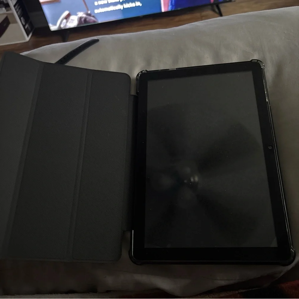 Sleek Blue Tablet with Cosmic Display and Modern Design